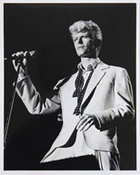 thumbnail link to original Chris Walter press photograph David Bowie on stage Anaheim 1983.
