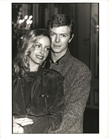 thumbnail link to original Paul Canty photograph David Bowie Sydne Rome, Cafe Royal, 1979.