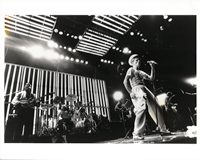 thumbnail link to original David Bowie 1978 world tour Andy Kent press photograph Bowie and full band on stage.